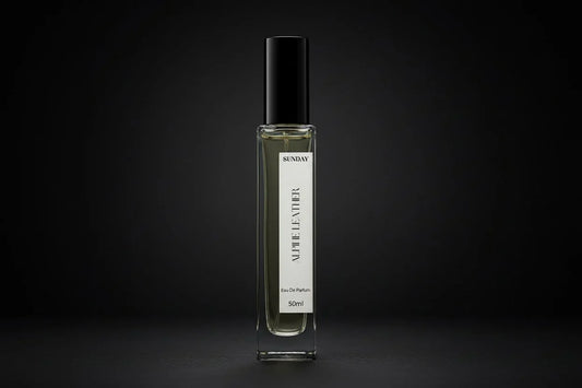 Perfume bottle labeled 'Sweet Sucre Creme' on a black background