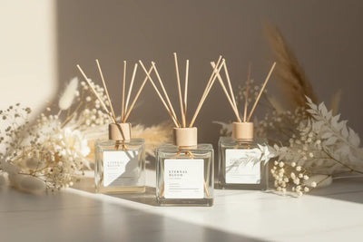 Perfume bottle with wooden cap on a white background